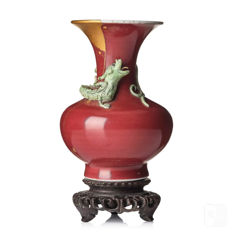 A red glazed vase,